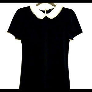 Black dress white collar. Perfect Halloween costume for Wednesday Adams.